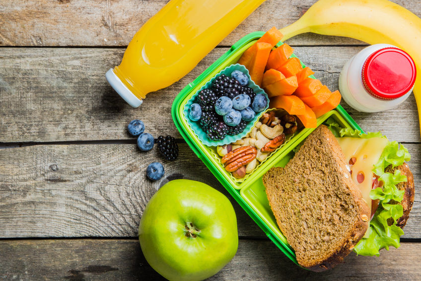 Healthy school lunch box on rustic background, copy space